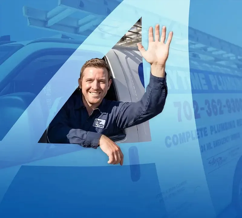 An Anytime technician in a navy uniform waving from the window of a company van, in the company’s blue tones
